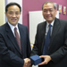 Mr TONG Man, Chief Magistrate presents a souvenir to Vice-President of the Supreme People's Court Mr XI Xiaoming (8 November)