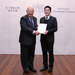 Chief Justice MA takes a picture with Mr Wong Siu-hung, Judicial Clerk, who received Encouragement Award, Staff Suggestions Scheme of the Judiciary (9 December)