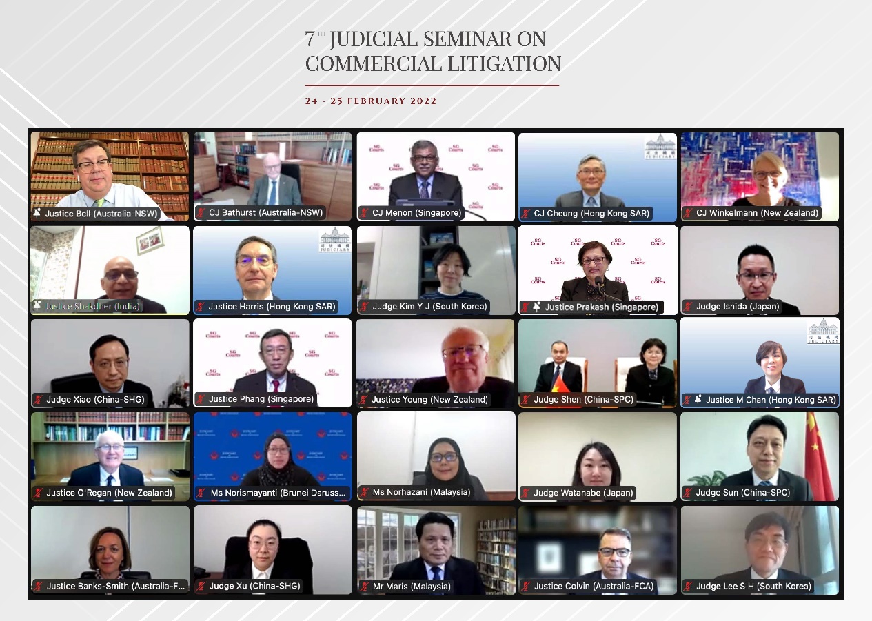 The Hon Chief Justice Andrew CHEUNG (top row, second right) and the Hon Mr Justice Jeremy POON, Chief Judge of the High Court, attend the 7th Judicial Seminar on Commercial Litigation via video conferencing.  The Hon Mr Justice Jonathan Russell HARRIS (second row, second left), the Hon Madam Justice Mimmie CHAN (third row, first right), the Hon Mr Justice Anthony CHAN, the Hon Mr Justice Russell Adam COLEMAN and the Hon Madam Justice Linda CHAN, Judges of the Court of First Instance of the High Court, speak at the Seminar via video conferencing (24-25 February)<br />(Photo: Supreme Court of Singapore)