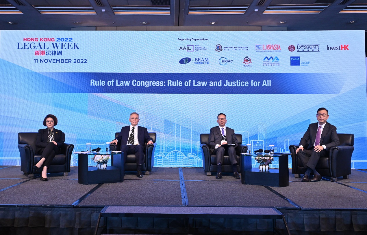 The Hon Mr Justice Robert TANG (second left), Non-Permanent Hong Kong Judge of the Court of Final Appeal, speaks as a panellist at one of the panel sessions under Hong Kong Legal Week 2022 (11 November)<br />(Photo: Department of Justice)